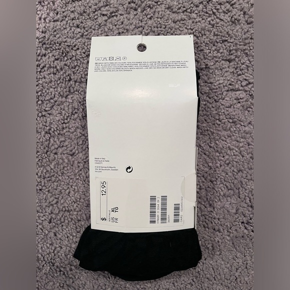 Three pairs of H&M black tights (XL) - animal print, sparky and tribal design - Picture 7 of 7